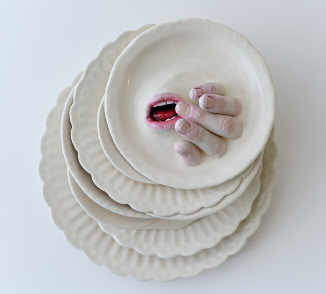 Ronit Baranga surreal hand mouth plate sculpture