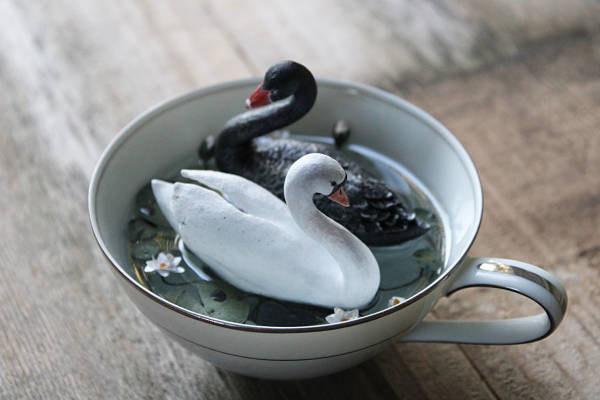 Meadow & Fawn swan resin sculpture in teacup 