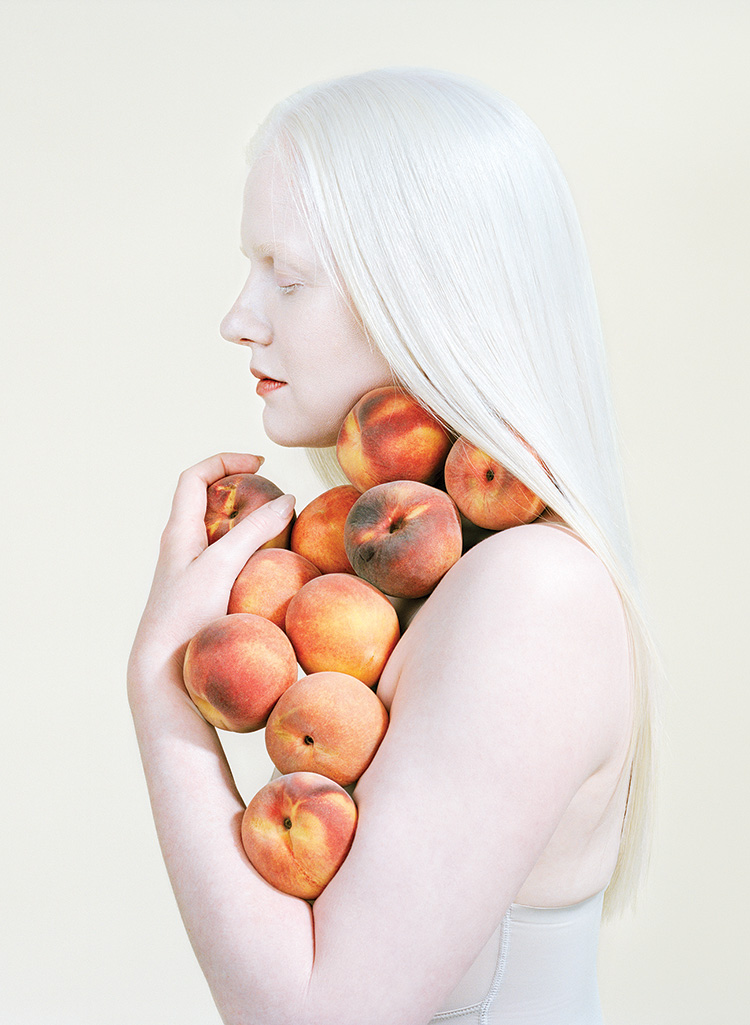 Petrina Hicks_woman holding peaches 