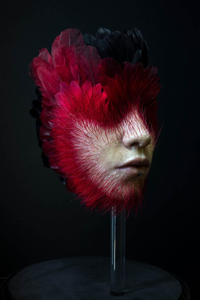 Raciel Romero Jimenez feather head sculpture