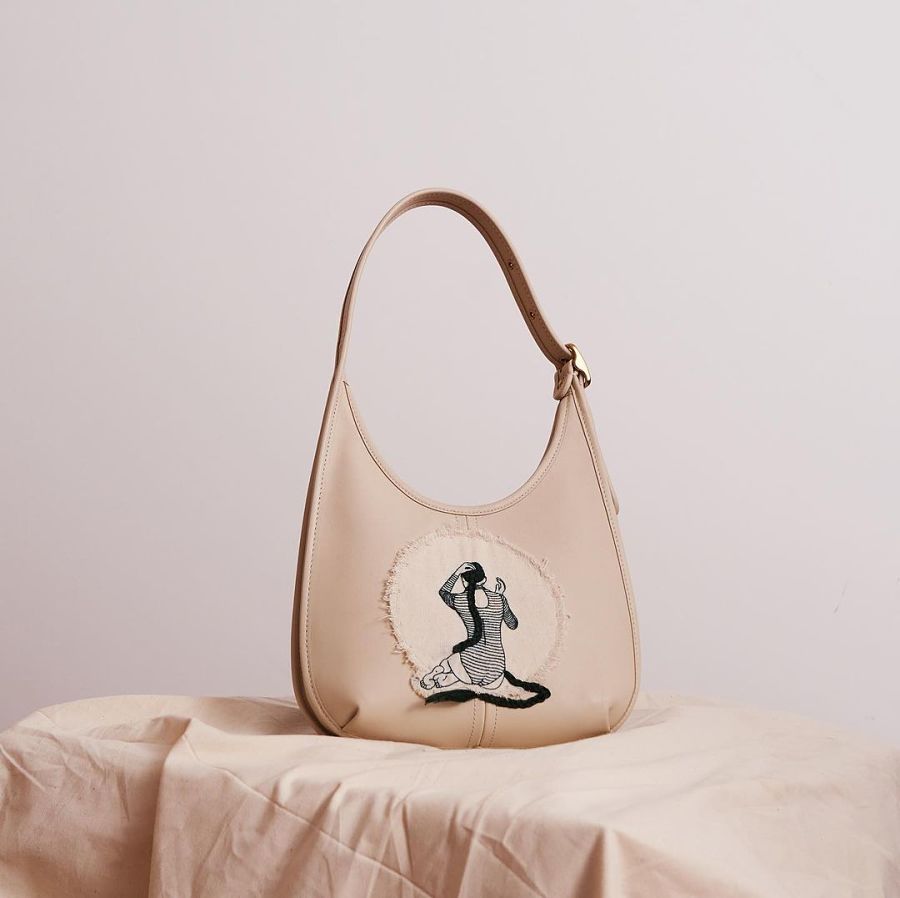 Sheena Liam In collaboration with Coach. Hand embroidered handbag